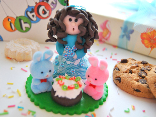 Girl And Bunnies Cake Topper
